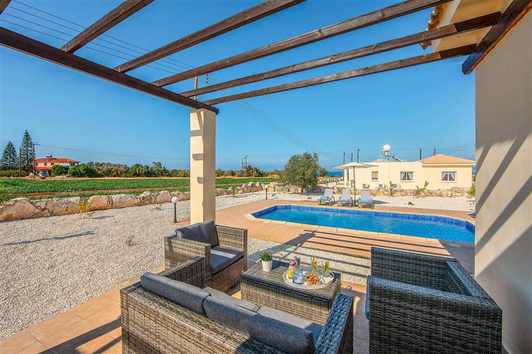 Garden and pool at Orange Tree Villa, Latchi
