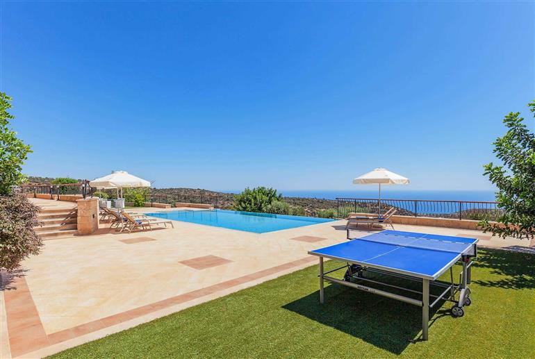 Garden and swimming pool at Villa Aphrodite Hills Elite 195, Aphrodite Hills