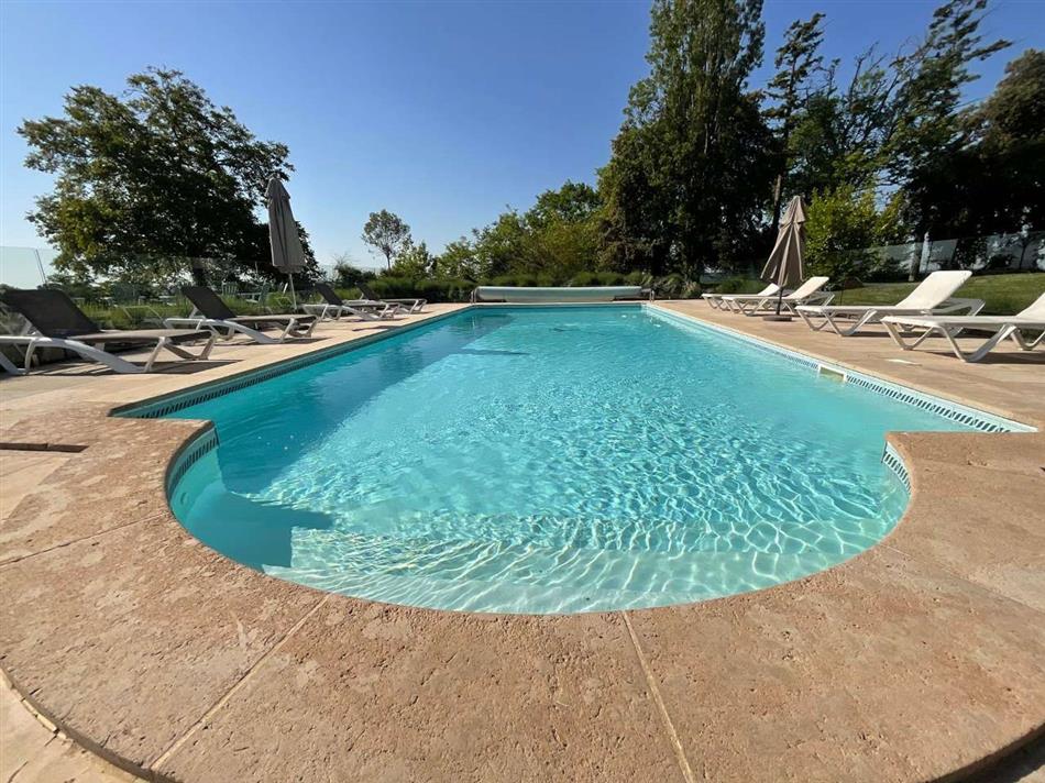Enjoy the swimming pool at La Brugere in