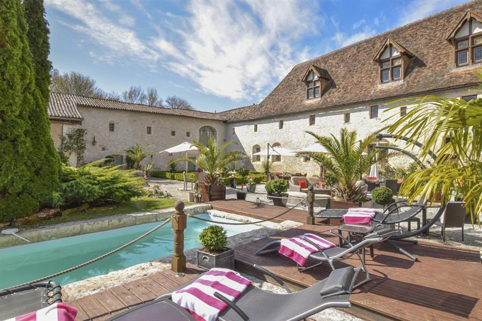 The swimming pool at Manoir Romanesque in France