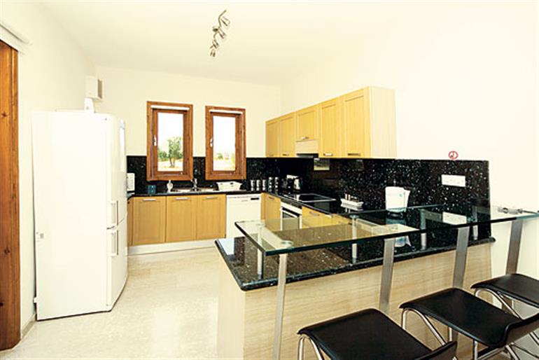 The kitchen in Thalia, Aphrodite Hills